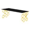 Qortni Black Glass Coffee Table With Gold Metal Legs