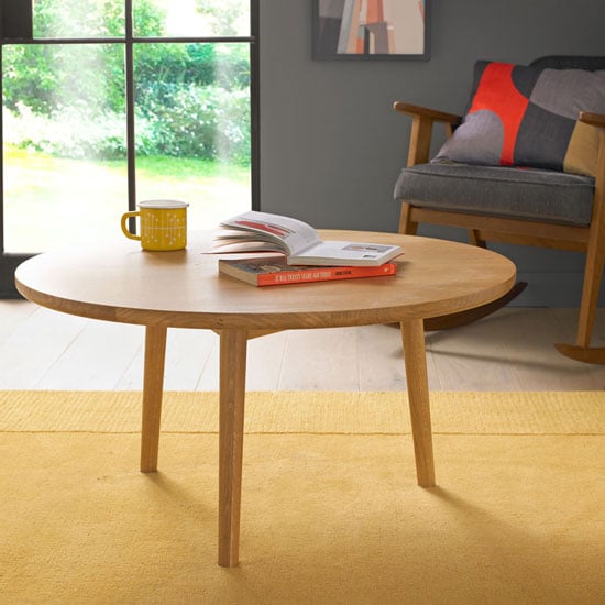 Skier Wooden Circular Coffee Table In Light Solid Oak